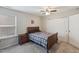 Bedroom with window, dresser and neutral walls providing a cozy, comfortable space at 3309 Turner Ridge Dr, New Hill, NC 27562