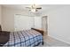 Bedroom featuring carpet, white doors, and natural light, offering a serene space at 3309 Turner Ridge Dr, New Hill, NC 27562