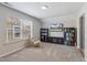 Bedroom featuring window, neutral walls and natural light, offering a serene space at 3309 Turner Ridge Dr, New Hill, NC 27562
