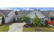 Beautiful home with craftsman details, manicured lawn, and a spacious driveway at 3309 Turner Ridge Dr, New Hill, NC 27562
