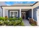 Inviting front porch with seating, flowers, and classic details creating a warm, welcoming entrance at 3309 Turner Ridge Dr, New Hill, NC 27562