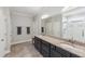 Bathroom featuring granite countertops, dual sinks, and a walk-in shower with glass door at 3309 Turner Ridge Dr, New Hill, NC 27562