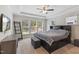 Comfortable main bedroom features lots of natural light and tray ceilings at 3309 Turner Ridge Dr, New Hill, NC 27562