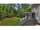 View of the home's rear featuring a spacious deck, screened-in porch at 3323 Cheswick Dr, Raleigh, NC 27609