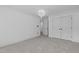 Spacious bedroom with carpet, white trim, and a view into the ensuite bathroom at 3323 Cheswick Dr, Raleigh, NC 27609