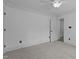 Neutral bedroom with white walls, beige carpet, and a ceiling fan at 3323 Cheswick Dr, Raleigh, NC 27609