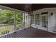 Back porch features a wooden ceiling and lots of natural light at 3323 Cheswick Dr, Raleigh, NC 27609