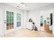 Bright dining area with access to the outdoors and a coffee bar at 3401 Sitzman Ct, Raleigh, NC 27616
