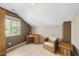 Cozy bedroom featuring hardwood floors, and a window with plenty of natural light at 3504 Lexham Ct, Apex, NC 27539