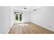 Bedroom featuring hardwood floors, a window with natural light and white walls at 3504 Lexham Ct, Apex, NC 27539