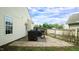 Backyard with patio, outdoor grill, and partial fence at 3709 Fan Palm Ct, Raleigh, NC 27616