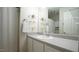 Well-lit bathroom featuring shower/tub and large mirror at 3709 Fan Palm Ct, Raleigh, NC 27616