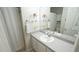 Well-lit bathroom featuring shower/tub and large mirror at 3709 Fan Palm Ct, Raleigh, NC 27616