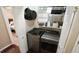 Convenient laundry room with a front-loading washer and dryer at 3709 Fan Palm Ct, Raleigh, NC 27616
