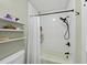 Clean and modern bathroom with white tiled shower and sleek black hardware at 4 Weathergreen Ct, Durham, NC 27713