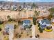 Aerial view of homes nestled on large lots with mature trees in established neighborhood at 405 Challenge Rd, Raleigh, NC 27603