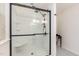 Modern bathroom with a glass-enclosed shower and updated fixtures at 405 Challenge Rd, Raleigh, NC 27603