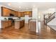 Updated kitchen with stainless steel appliances, granite countertops, and custom cabinetry at 405 Challenge Rd, Raleigh, NC 27603