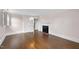 Bedroom features a decorative fireplace and entrance to another room at 406 E Lee St, Smithfield, NC 27577