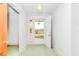 Bright foyer with view to the yard through the open front door at 411 W Killiegrey St, Lillington, NC 27546
