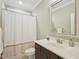 Bathroom features a vanity with sink, a mirror, and a shower with a curtain at 4125 Enfield Ridge Dr, Cary, NC 27519