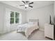 Bedroom with large window, sheer curtains, and a view at 4125 Enfield Ridge Dr, Cary, NC 27519