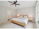Bright bedroom with a ceiling fan, neutral walls, and a comfortable bed at 4125 Enfield Ridge Dr, Cary, NC 27519