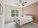 Light-filled bedroom with window view and comfortable bed at 4125 Enfield Ridge Dr, Cary, NC 27519