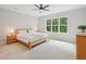 Bedroom features a large window and a ceiling fan at 4125 Enfield Ridge Dr, Cary, NC 27519