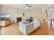Comfortable living room with hardwood floors, fireplace, and modern furniture at 4125 Enfield Ridge Dr, Cary, NC 27519