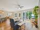 Open living room with hardwood floors, fireplace, and plenty of natural light at 4125 Enfield Ridge Dr, Cary, NC 27519