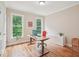 Office with hardwood floors, natural light, a computer desk, and a red chair at 4125 Enfield Ridge Dr, Cary, NC 27519