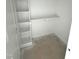Walk-in closet with built-in shelves, perfect for organizing and storing clothes and accessories at 4167 Old Stage N Rd # 4, Angier, NC 27501