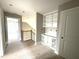 Upstairs hallway featuring built-in desk and staircase with wooden banister at 4167 Old Stage N Rd # 4, Angier, NC 27501