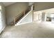 Living room with staircase leading up to the second floor at 4167 Old Stage N Rd # 4, Angier, NC 27501
