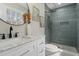 Modern bathroom featuring a marble vanity, stylish lighting, and a beautifully tiled shower, providing a spa-like experience at 4307 Pope Rd, Durham, NC 27707