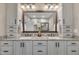 Bathroom featuring granite countertops, double sinks, and ample storage at 4802 Glenmist Ct, Raleigh, NC 27612