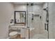 Updated bathroom with granite vanity and a glass enclosed tile shower at 4802 Glenmist Ct, Raleigh, NC 27612
