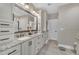 Bathroom featuring granite countertops, double sinks, and ample storage at 4802 Glenmist Ct, Raleigh, NC 27612