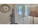 Inviting front door entryway featuring decor and a large clock at 4802 Glenmist Ct, Raleigh, NC 27612