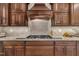 Well-equipped kitchen featuring stylish cabinetry, granite countertops, and modern stainless steel appliances at 4802 Glenmist Ct, Raleigh, NC 27612