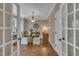 Cozy office space with hardwood floors, pendant lighting, and lots of workspace at 4802 Glenmist Ct, Raleigh, NC 27612
