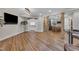 Open basement recreation area with access to the kitchen and a large entertainment area at 4802 Glenmist Ct, Raleigh, NC 27612