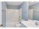 Full bathroom with a shower-tub combo and modern fixtures at 5314 Taproot Ln, Durham, NC 27705