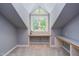 Upstairs bonus room features built-in desks and a large window with green views at 5314 Taproot Ln, Durham, NC 27705
