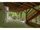 Covered patio with direct access to the backyard and wooded view at 5314 Taproot Ln, Durham, NC 27705