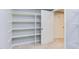 Storage space with shelving, offering ample storage solutions at 5314 Taproot Ln, Durham, NC 27705