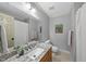 Bathroom with granite countertop, framed mirror, toilet and shower-tub combination at 5513 Doemont Dr, Apex, NC 27539