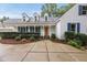 Inviting home exterior with blue shutters, dormer windows, and a well-manicured lawn at 5513 Doemont Dr, Apex, NC 27539