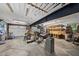 Large garage interior with work tables, shelving, and tools, ideal for hobbies and storage at 5513 Doemont Dr, Apex, NC 27539